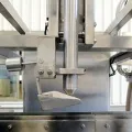 Llenadora automática de tambores (Alineación fotoeléctrica y visión artificial)