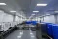 Línea automática de envasado para tambores sobre palet e IBCs
